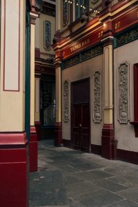 Charming view of an ornate tapas bar entrance in London's historic district.